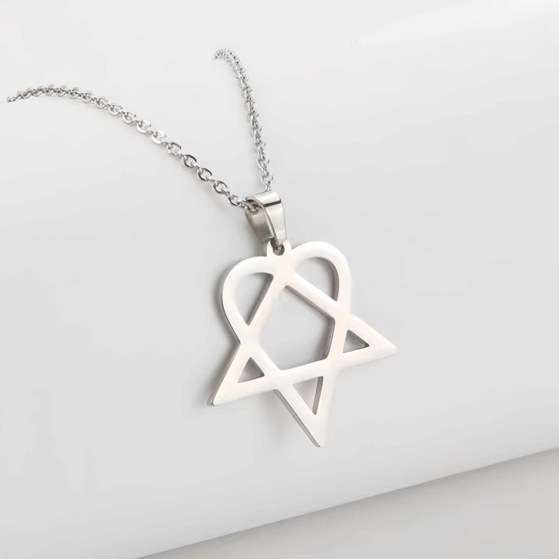 Euro-American Titanium Steel Hollow Heart Necklace Simple Gold-Plated Pendant