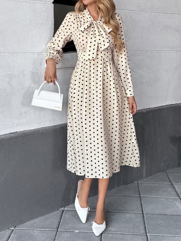 Elegant mid-length skirt with bow tie collar, long sleeves and waist polka dot dress